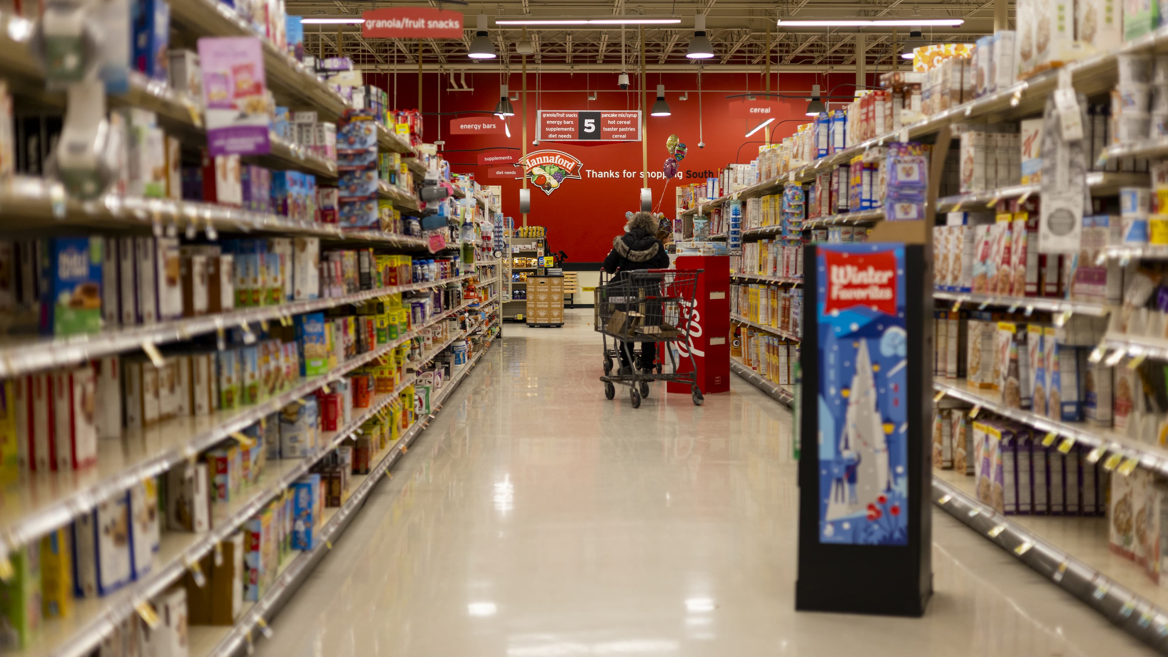 Grocery store aisle stocked with packaged food