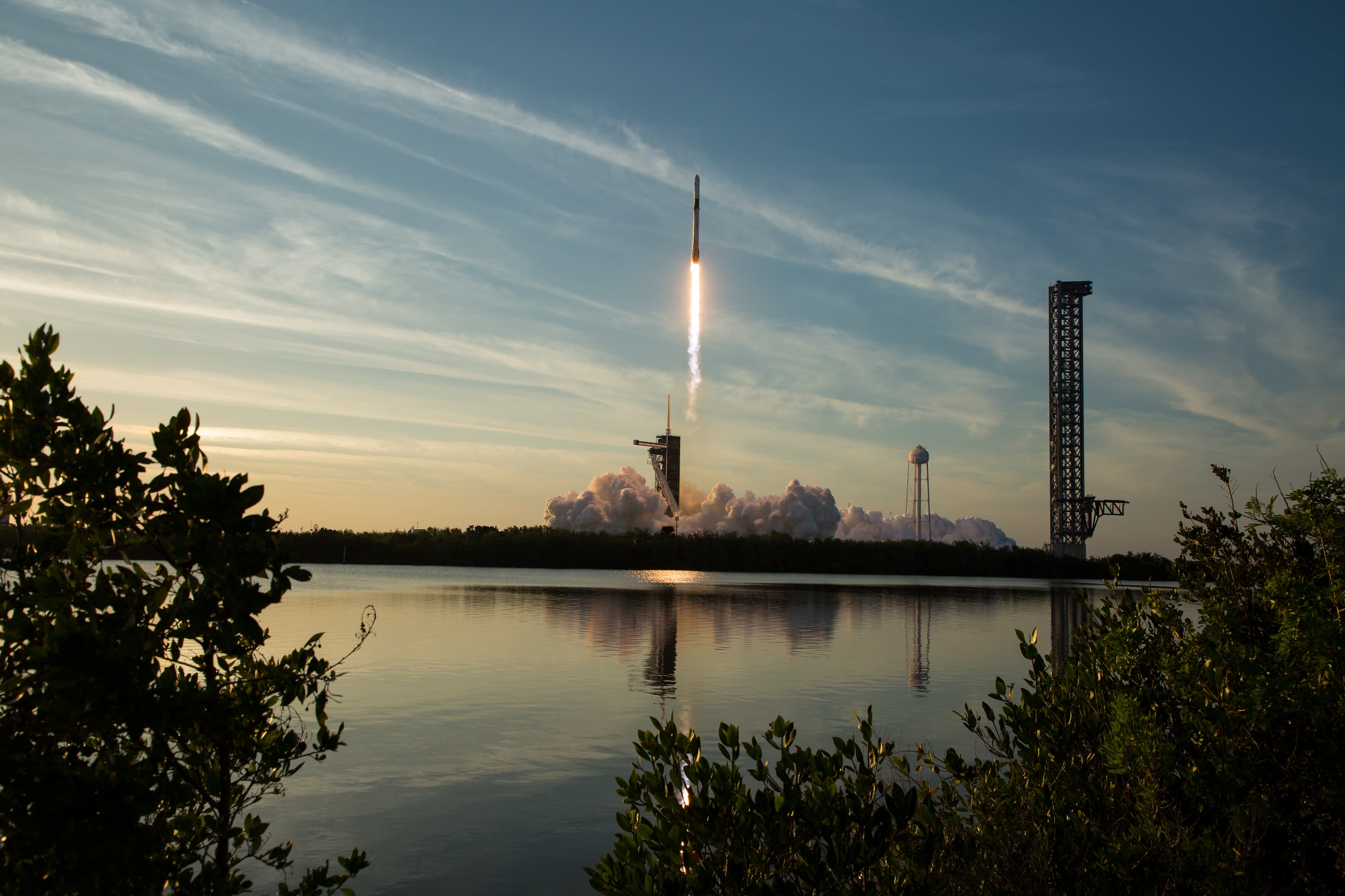 A Falcon 9 rocket launches carrying a Dragon spacecraft